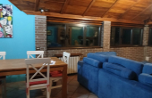 Soggiorno con angolo cottura 